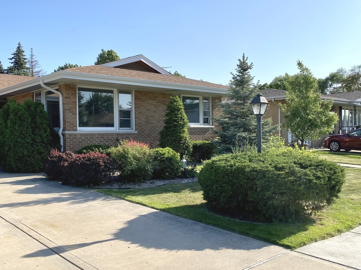 3515 173rd Place Lansing, IL 60438 - Photo 3 of 26 a front view of a house with garden
