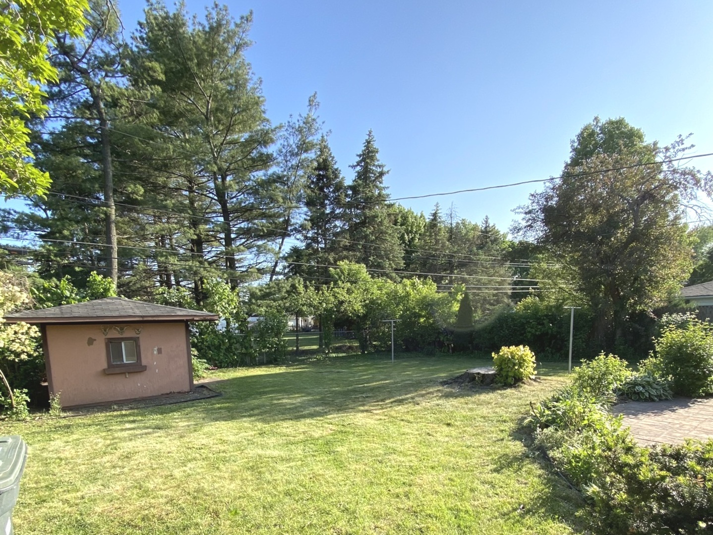 3515 173rd Place Lansing, IL 60438 - Photo 7 of 26 a backyard of a house with lots of green space