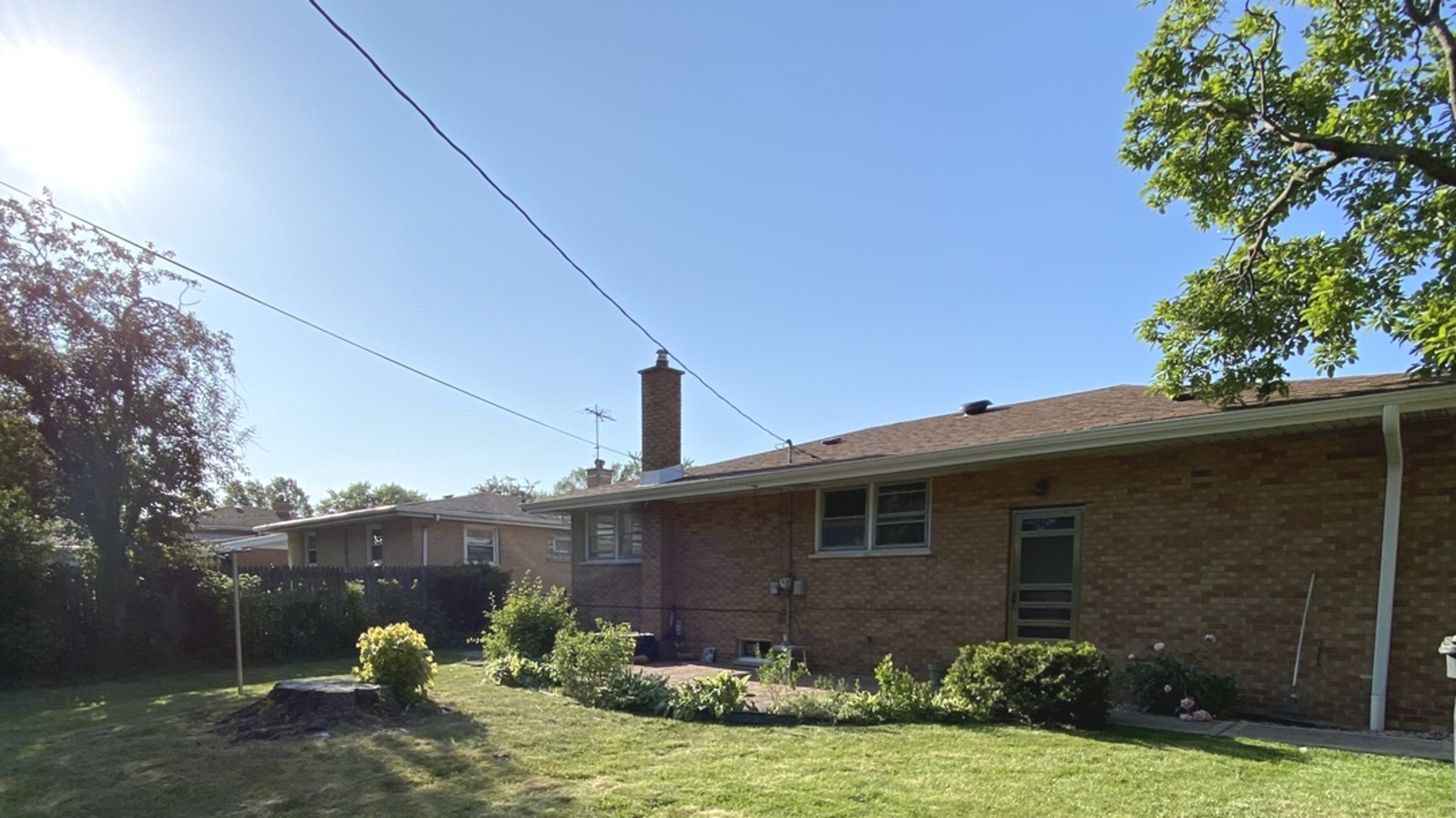 3515 173rd Place Lansing, IL 60438 - Photo 9 of 26 a front view of a house with garden
