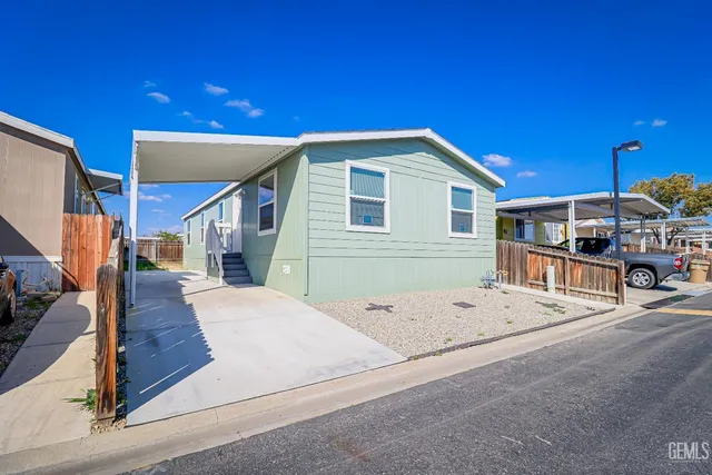 a very nice looking house with a large window