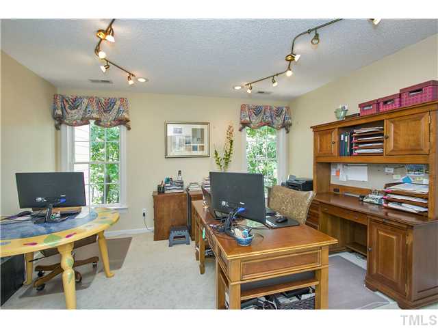 8909 Breeland Way Raleigh, NC 27613 - Photo 17 of 25 a workspace with furniture and a window