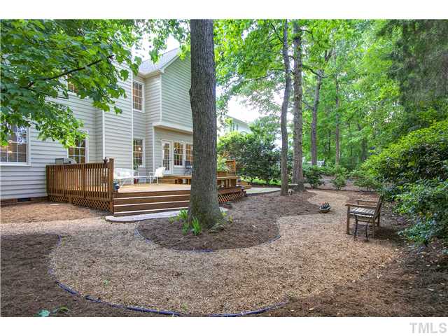 8909 Breeland Way Raleigh, NC 27613 - Photo 24 of 25 a view of a house with backyard and sitting area