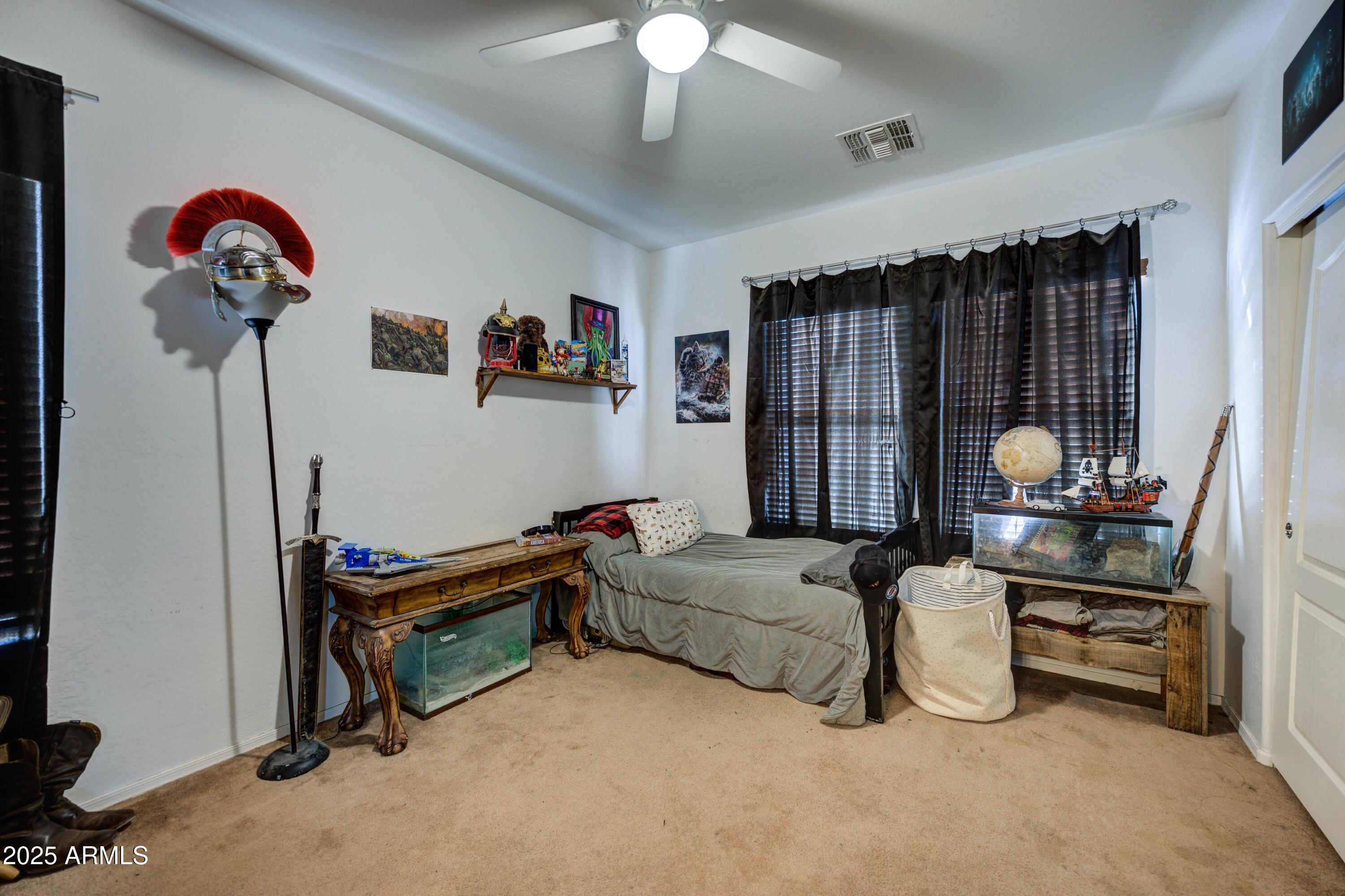 9778 Barley Road Florence, AZ 85132 - Photo 27 of 58 Main Floor Primary Suite