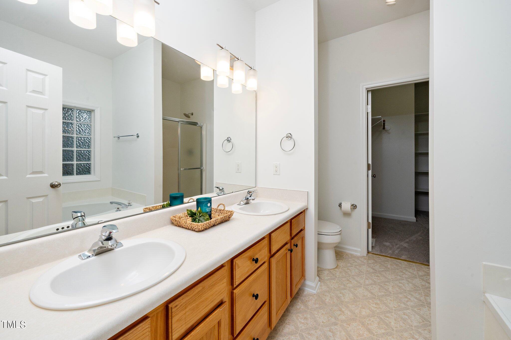 2917 Beehnon Way Raleigh, NC 27603 - Photo 20 of 39 Primary bedroom bath double sink