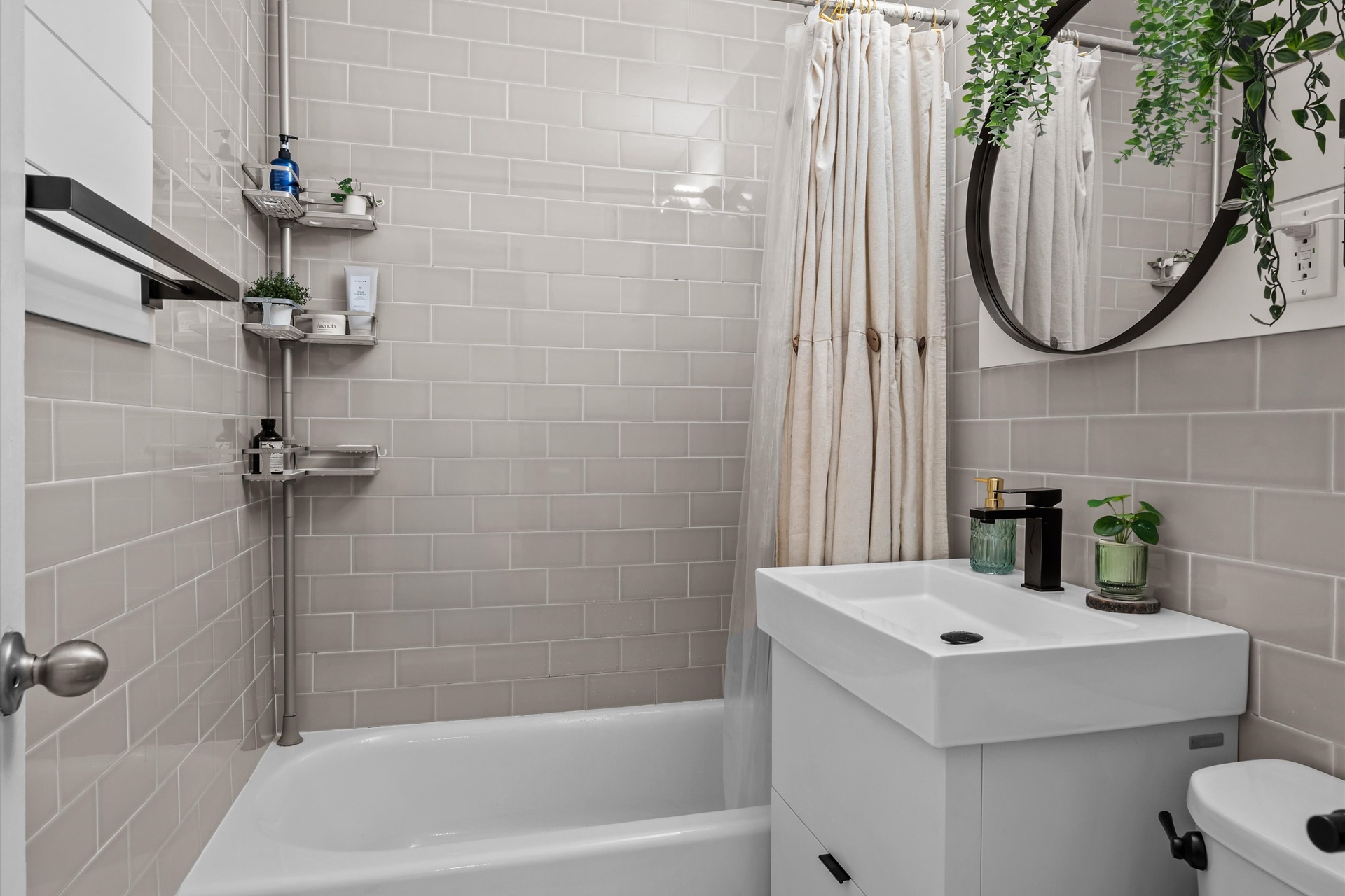 3520 Tryon Avenue, Unit 603 Bronx, NY 10467 - Photo 13 of 15 a bathroom with a sink a toilet and shower