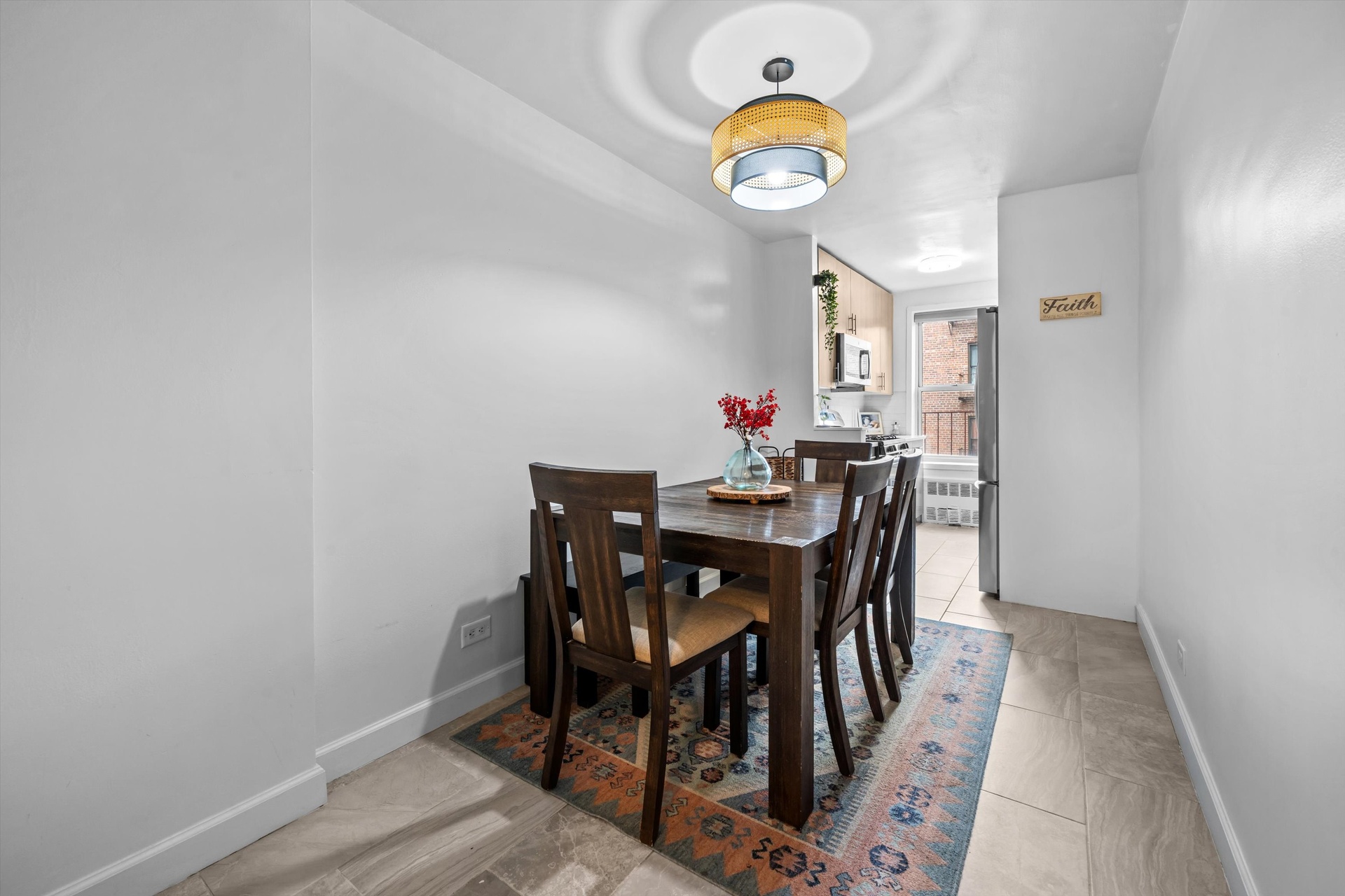 3520 Tryon Avenue, Unit 603 Bronx, NY 10467 - Photo 6 of 15 a view of a dining room with a table and chairs