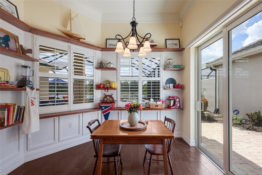 5011 Tobermory Way Bradenton, FL 34211 - Photo 13 of 77 a view of a dining room with furniture and window