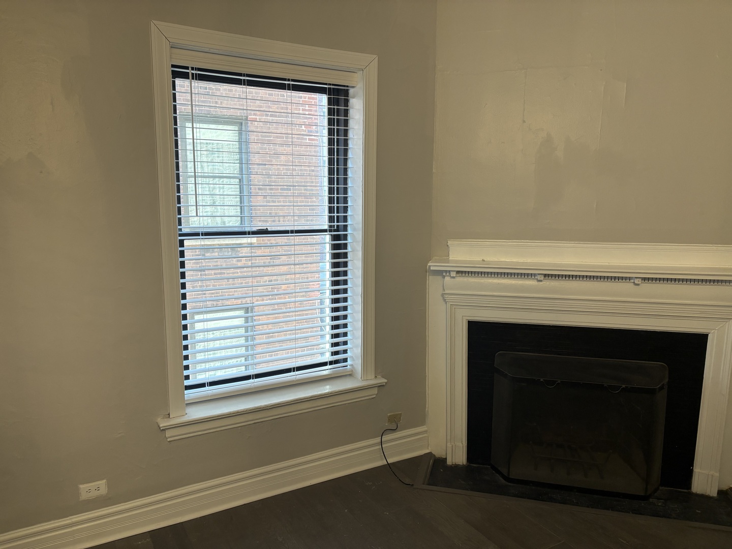 20 East Goethe Street, Unit 404 Chicago, IL 60610 - Photo 5 of 8 a white building with a fireplace