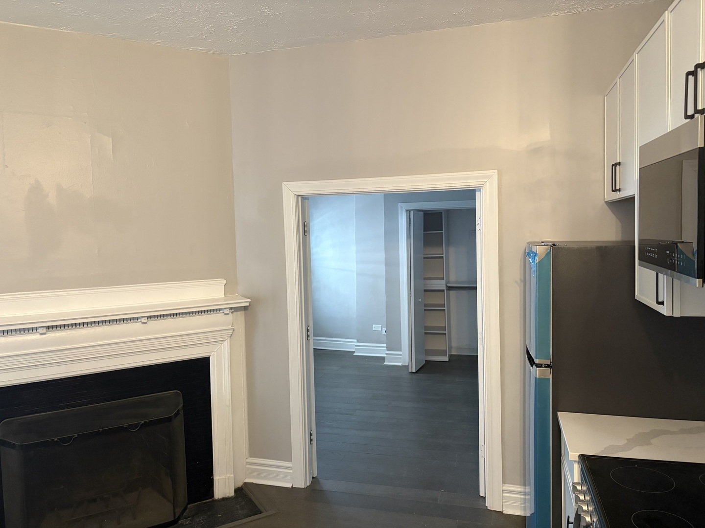 20 East Goethe Street, Unit 404 Chicago, IL 60610 - Photo 6 of 8 a view of a livingroom with a fireplace