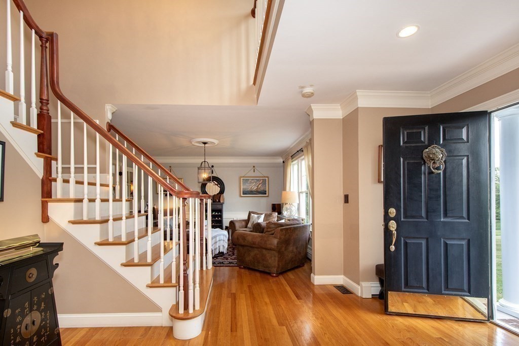 124 Hillcrest Road Marshfield, MA 02050 - Photo 14 of 41 a view of a livingroom with furniture and stairs