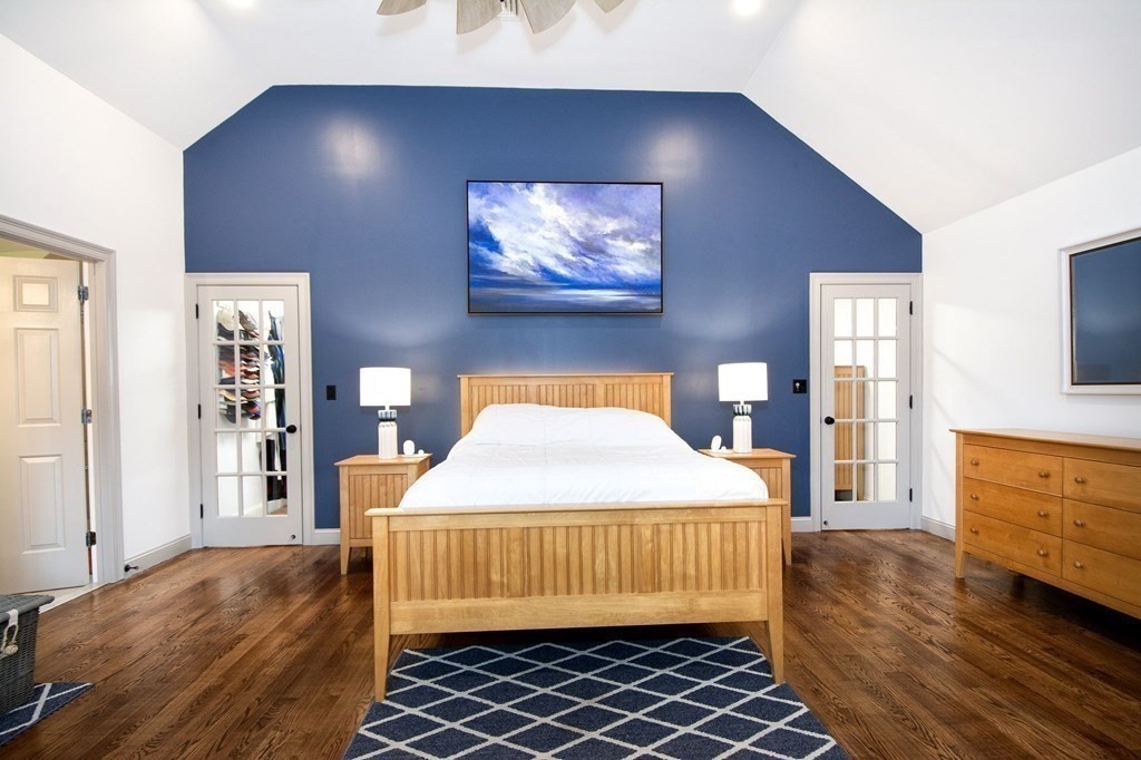 124 Hillcrest Road Marshfield, MA 02050 - Photo 16 of 41 a bedroom with a bed and wooden floor