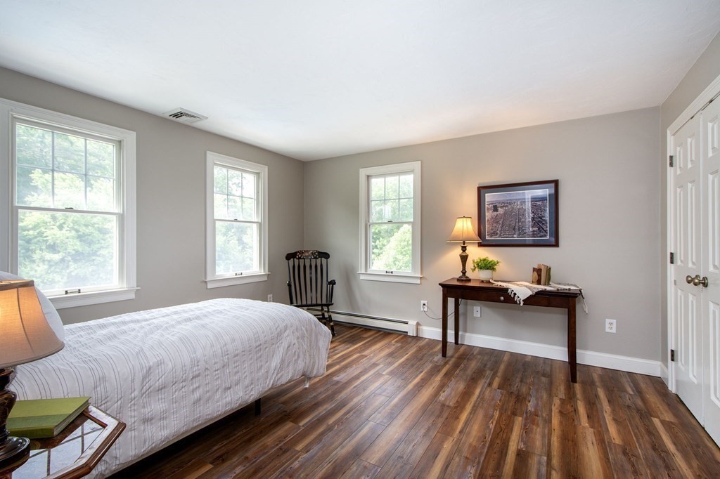 124 Hillcrest Road Marshfield, MA 02050 - Photo 21 of 41 a bedroom with a bed and a window