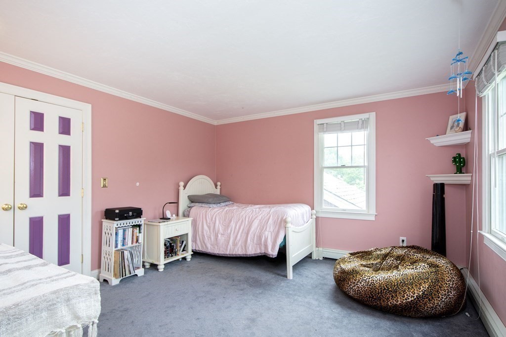 124 Hillcrest Road Marshfield, MA 02050 - Photo 25 of 41 a bedroom with a bed and a window