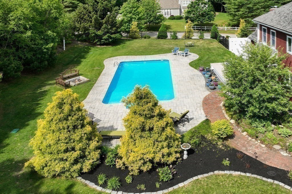 124 Hillcrest Road Marshfield, MA 02050 - Photo 38 of 41 a view of a garden with plants and large trees