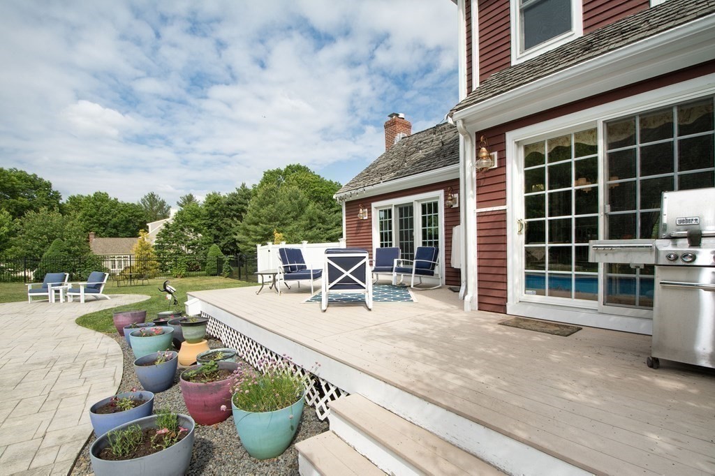 124 Hillcrest Road Marshfield, MA 02050 - Photo 40 of 41 a view of a chairs and table in backyard