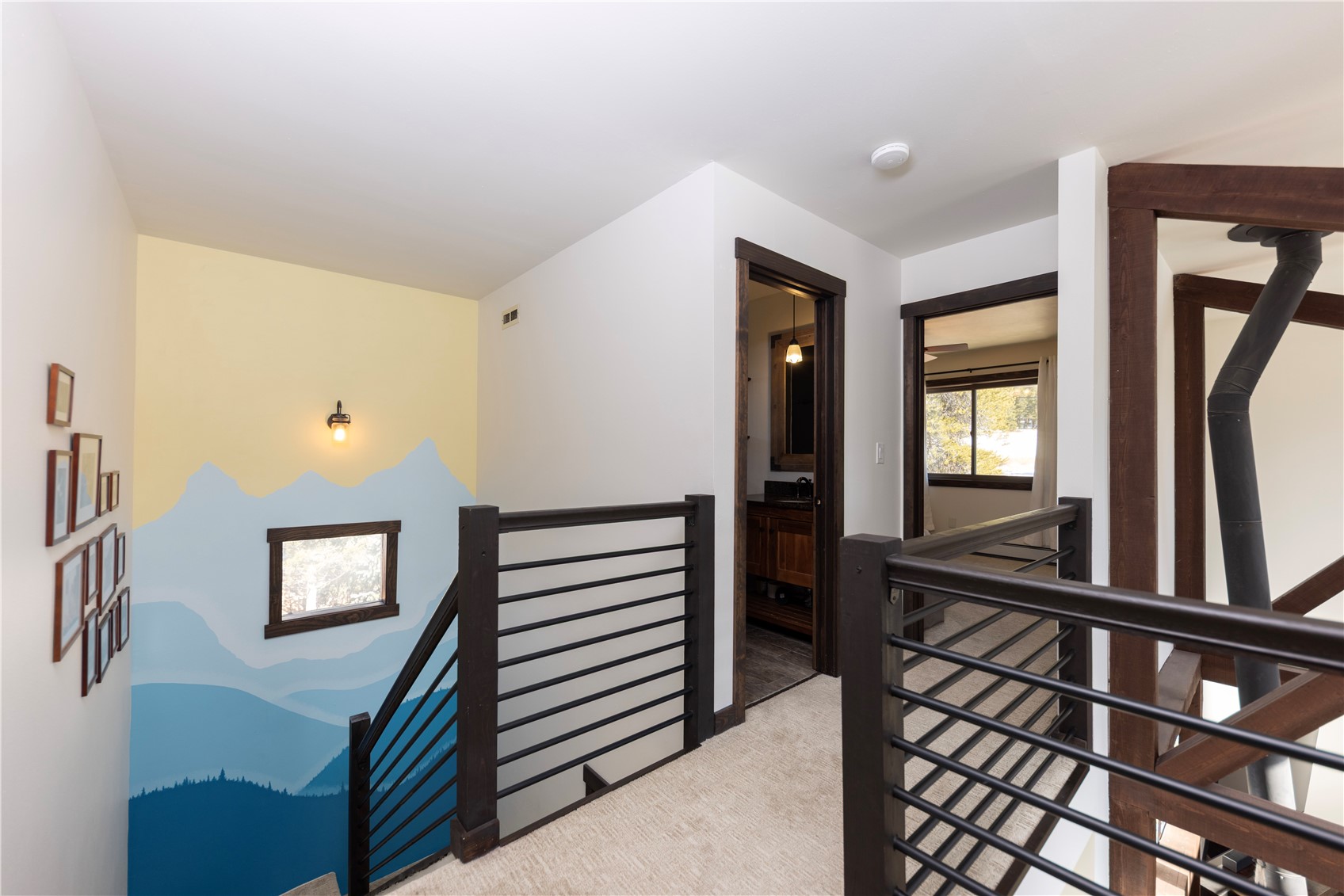 357 Vail Circle Dillon, CO 80435 - Photo 17 of 30 a view of entryway and hall with wooden floor