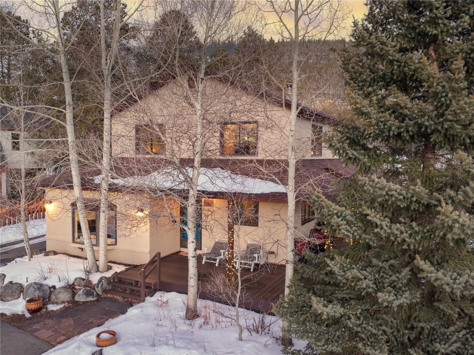 357 Vail Circle Dillon, CO 80435 - Photo 30 of 30 a backyard of a house with table and chairs
