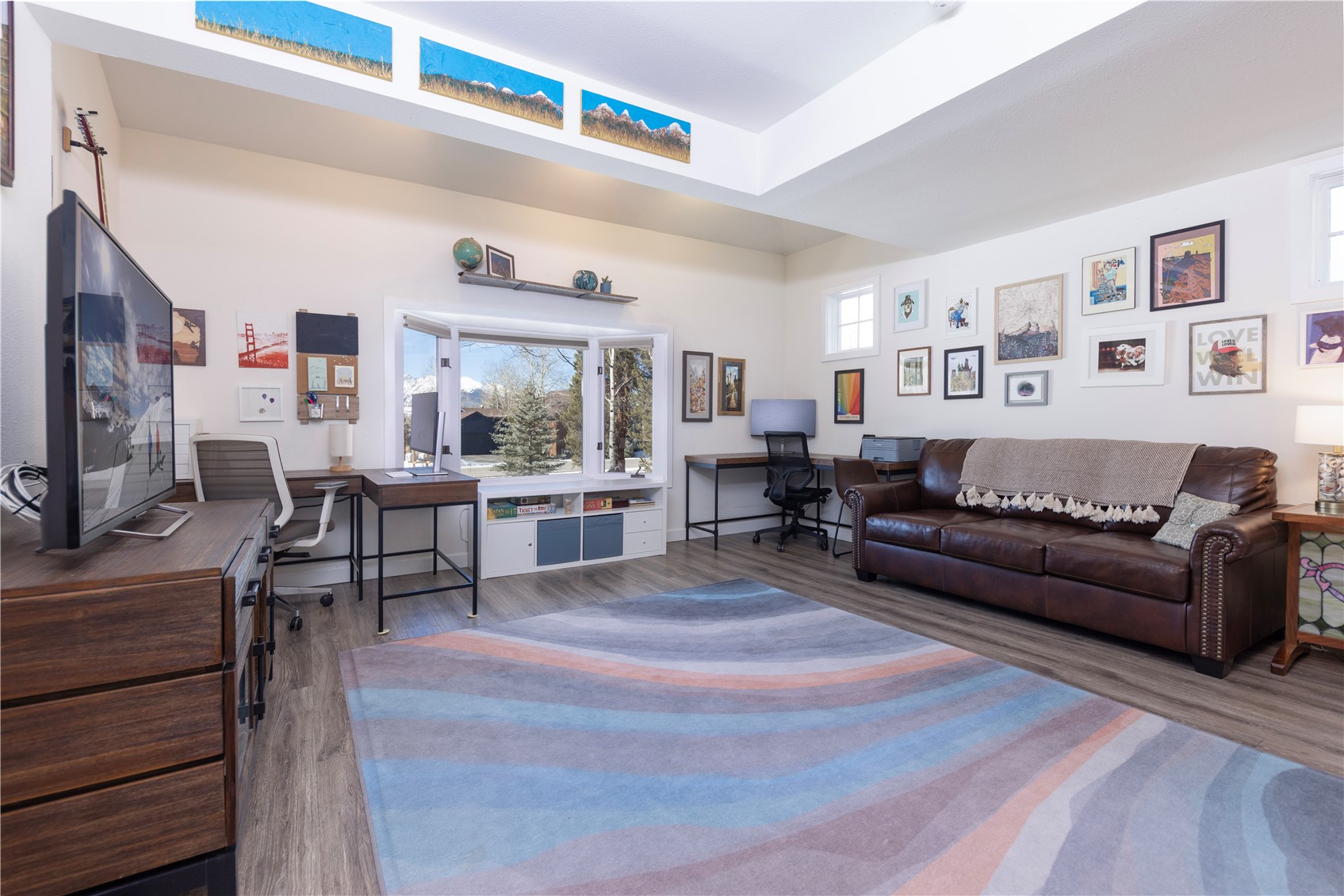 357 Vail Circle Dillon, CO 80435 - Photo 8 of 30 a living room with furniture and a flat screen tv