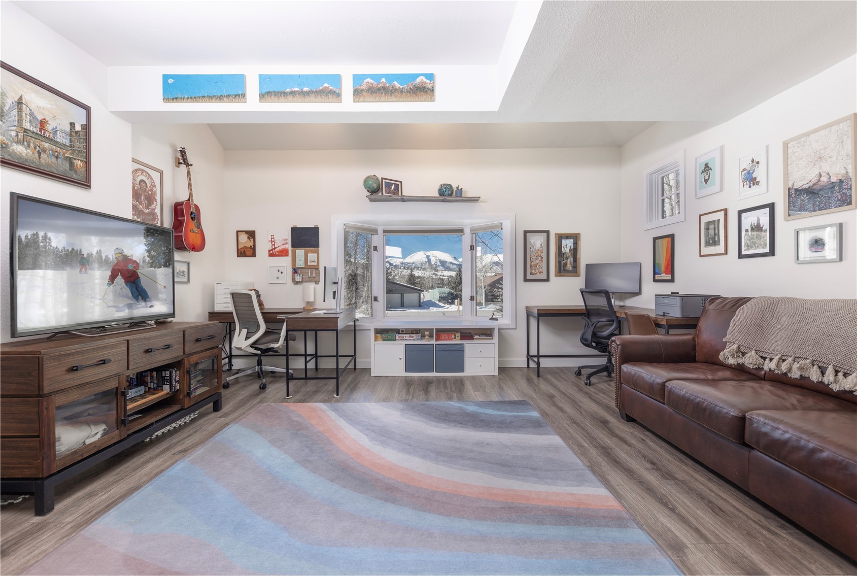 357 Vail Circle Dillon, CO 80435 - Photo 9 of 30 a living room with furniture and a flat screen tv