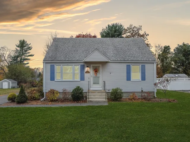 a view of a house with a garden