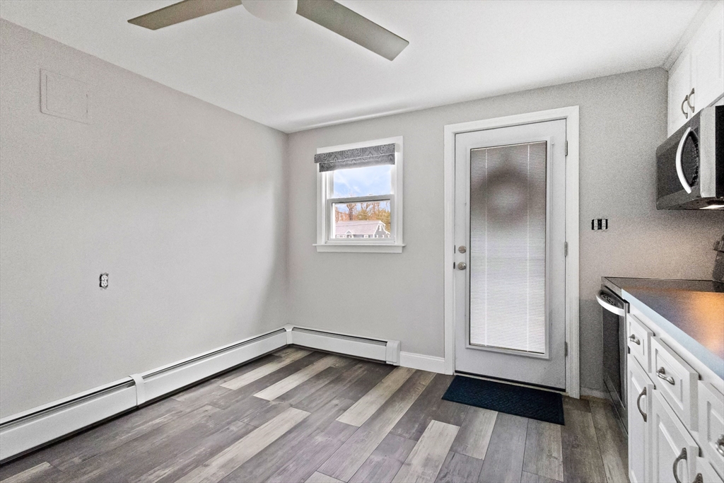 2 Campus Road Methuen, MA 01844 - Photo 8 of 19 an empty room with wooden floor and window
