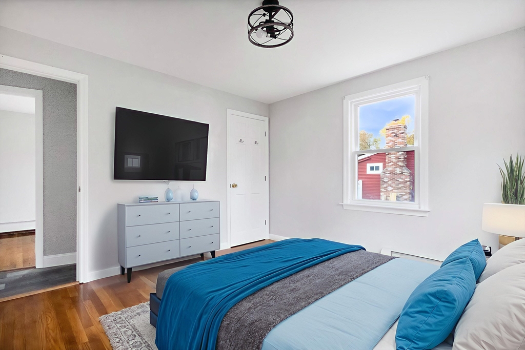 2 Campus Road Methuen, MA 01844 - Photo 10 of 19 a bedroom with a bed and a flat screen tv