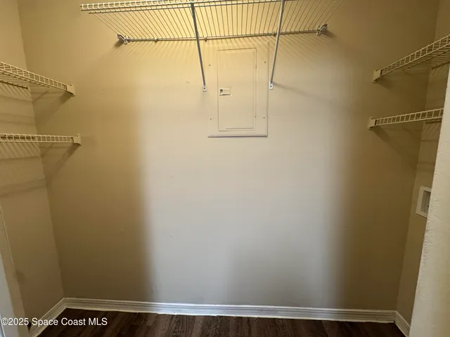 a view of swimming pool and trees in the background