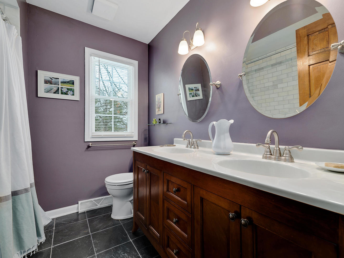 27W626 Garys Mill Road Winfield, IL 60190 - Photo 17 of 23 a bathroom with a double vanity sink and a mirror