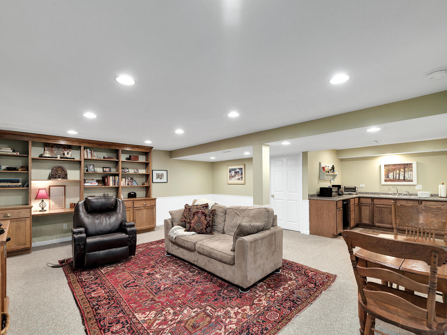 27W626 Garys Mill Road Winfield, IL 60190 - Photo 18 of 23 a living room with furniture and kitchen view