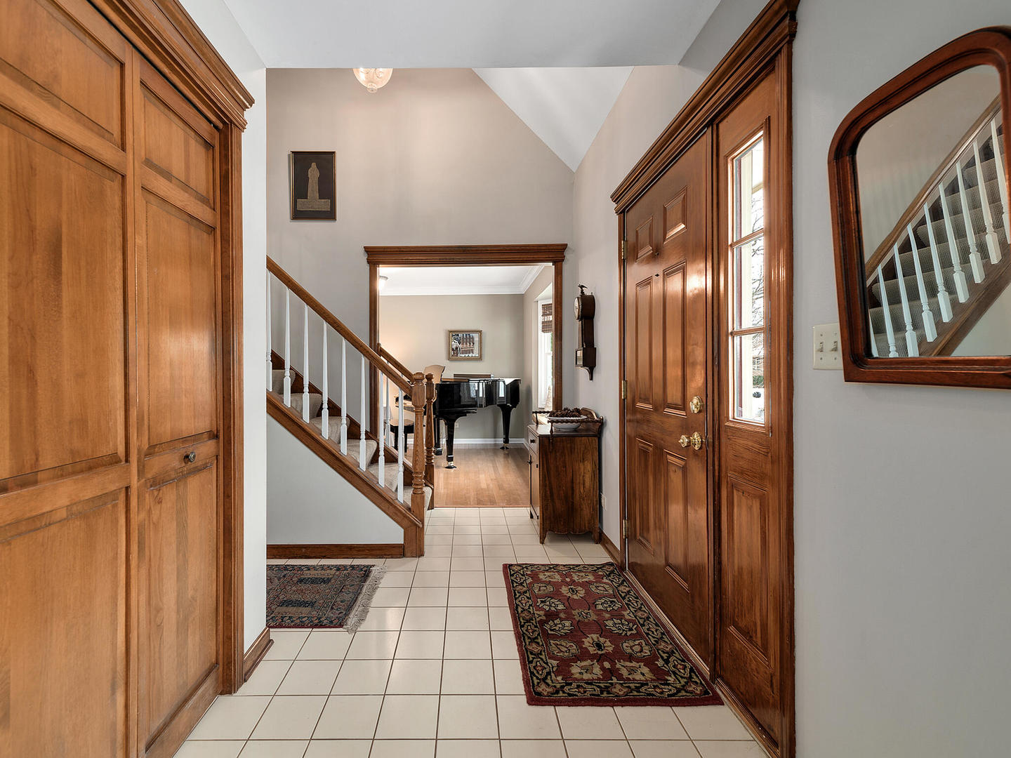 27W626 Garys Mill Road Winfield, IL 60190 - Photo 3 of 23 a view of a hallway with wooden floor and staircase