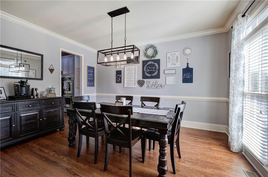 12 Autumn Wood Drive Cartersville, GA 30120 - Photo 15 of 48 a view of a dining room with furniture window and wooden floor