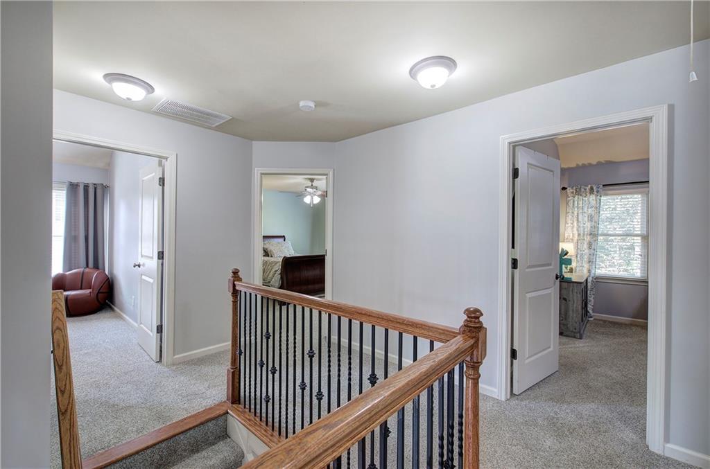 12 Autumn Wood Drive Cartersville, GA 30120 - Photo 18 of 48 a view of a hallway to a livingroom and a couch