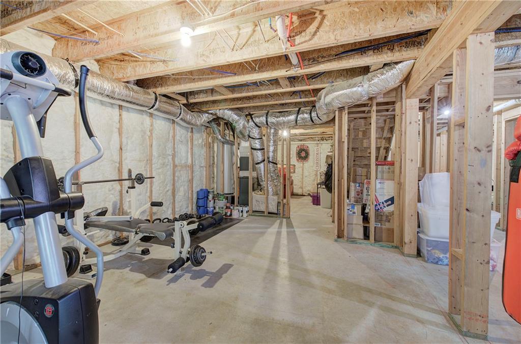 12 Autumn Wood Drive Cartersville, GA 30120 - Photo 42 of 48 a view of a room with gym equipment