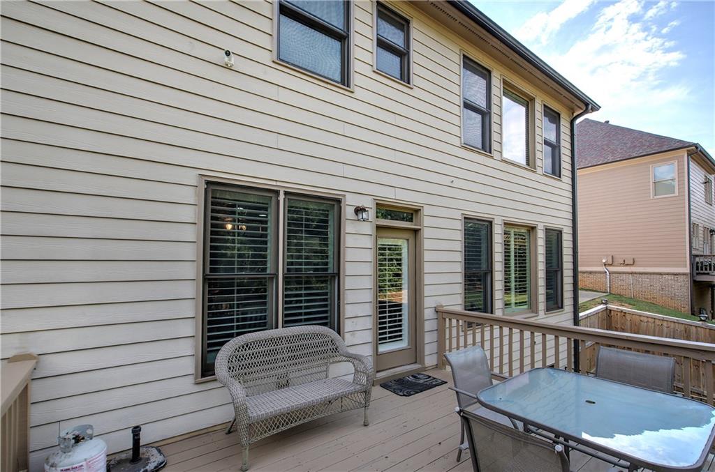 12 Autumn Wood Drive Cartersville, GA 30120 - Photo 43 of 48 a view of a chair and table in the balcony