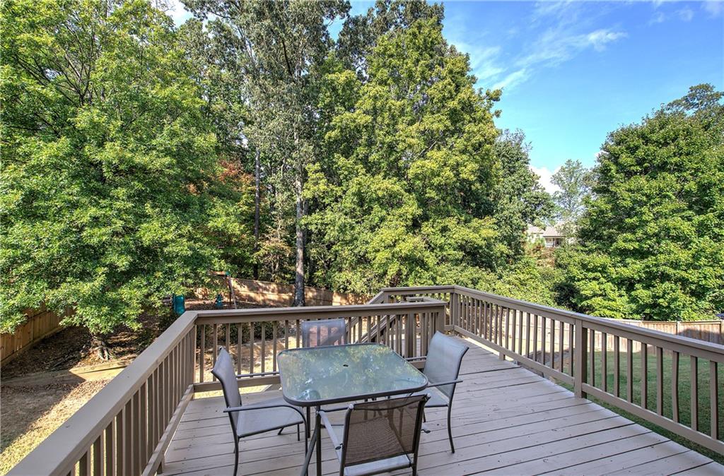 12 Autumn Wood Drive Cartersville, GA 30120 - Photo 44 of 48 a view of a wooden deck with a patio