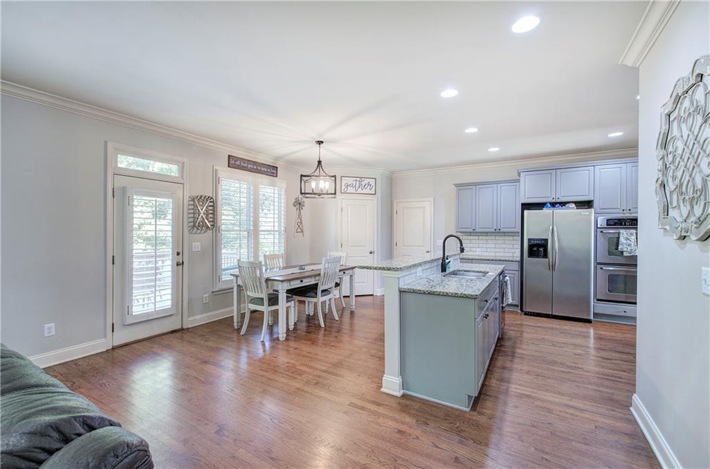 12 Autumn Wood Drive Cartersville, GA 30120 - Photo 10 of 48 a view of a dining room with furniture and wooden floor