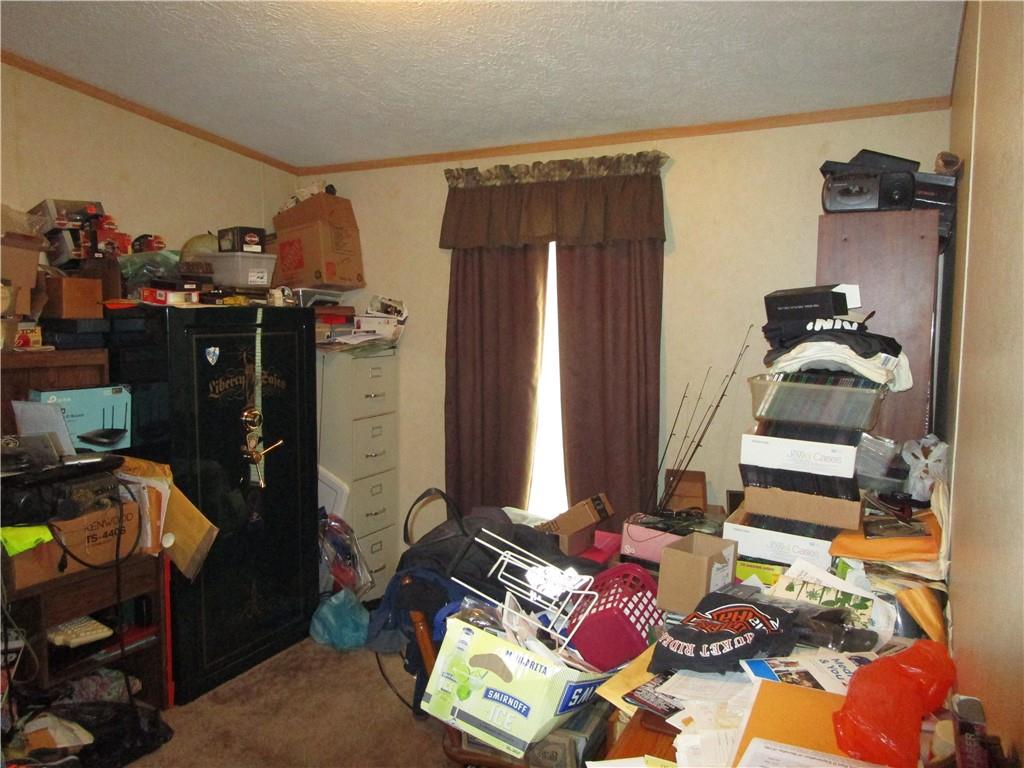 615 Amy Lane Butler, PA 16001 - Photo 11 of 13 walk in closet with clothes and shoes