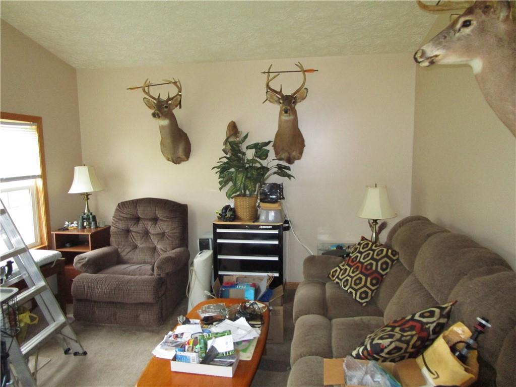 615 Amy Lane Butler, PA 16001 - Photo 13 of 13 a living room with furniture and a wooden floor