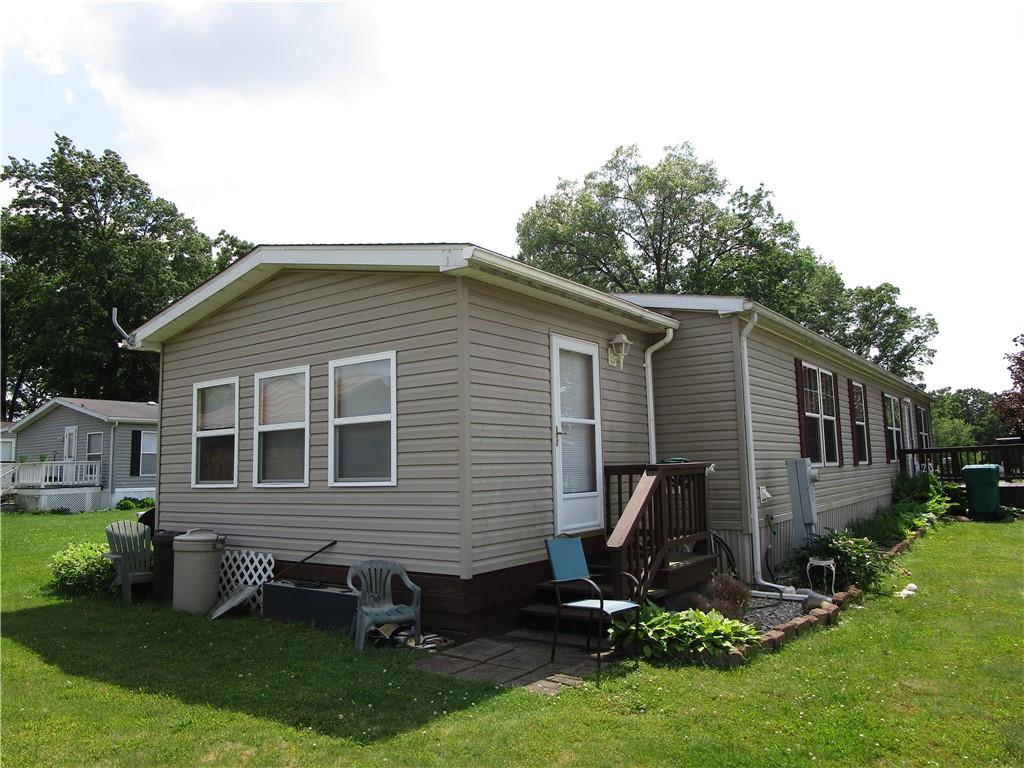 615 Amy Lane Butler, PA 16001 - Photo 3 of 13 a backyard of a house with table and chairs