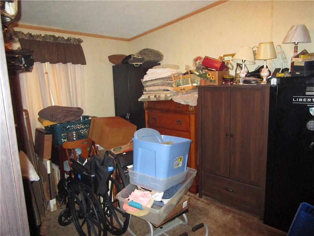 615 Amy Lane Butler, PA 16001 - Photo 9 of 13 a outdoor dining space with furniture a potted plant and wooden floor
