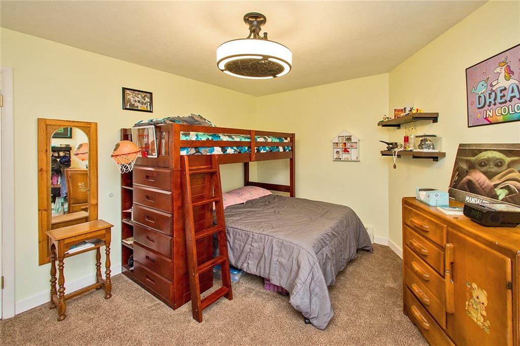 584 Elliotsville Road Farmington, PA 15437 - Photo 13 of 25 The third spacious bedroom.
