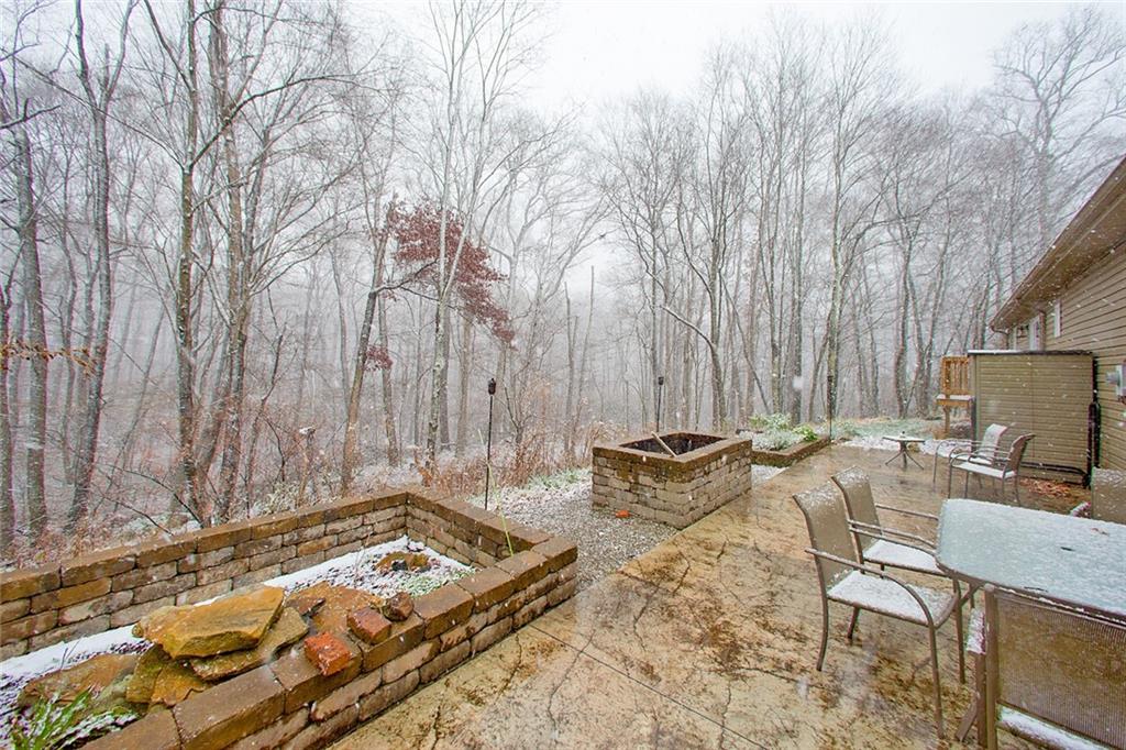 584 Elliotsville Road Farmington, PA 15437 - Photo 18 of 25 Raised garden beds, and a fire pit! Great for marshmallow roasting!!