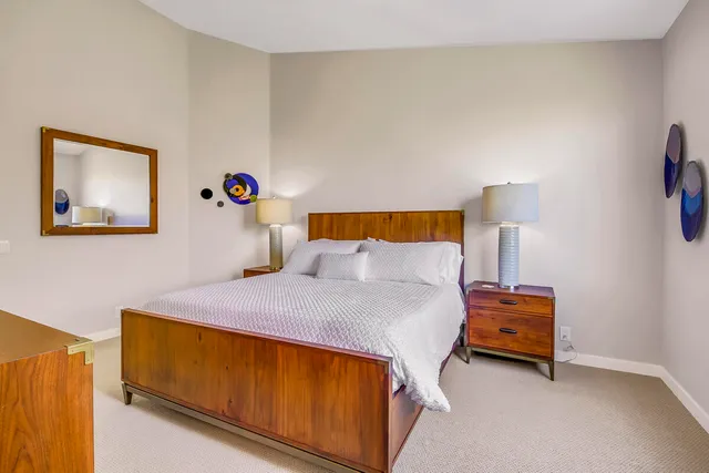 a bathroom with a double vanity sink mirror and double