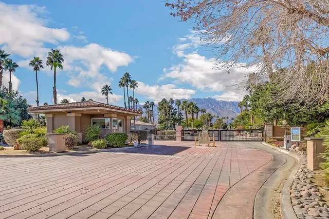 a view of a street in front of a house