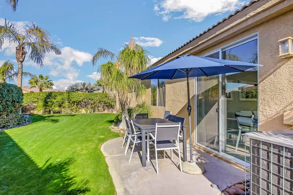 a view of an outdoor space and tennis court