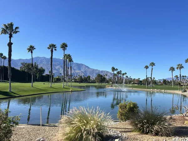 a view of a lake with a mountain in the background