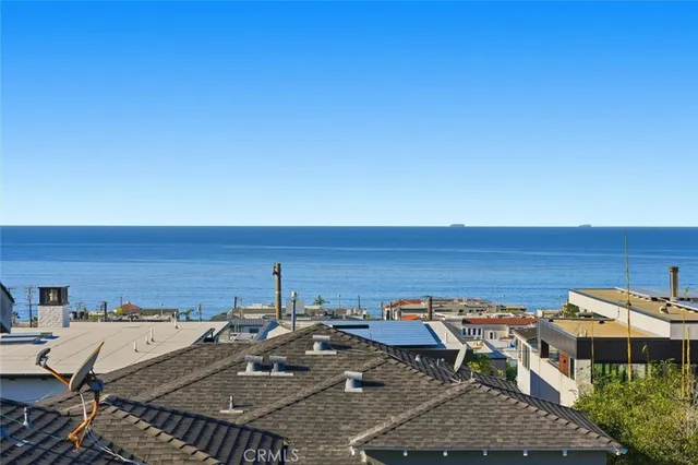 an aerial view of a house with a outdoor space