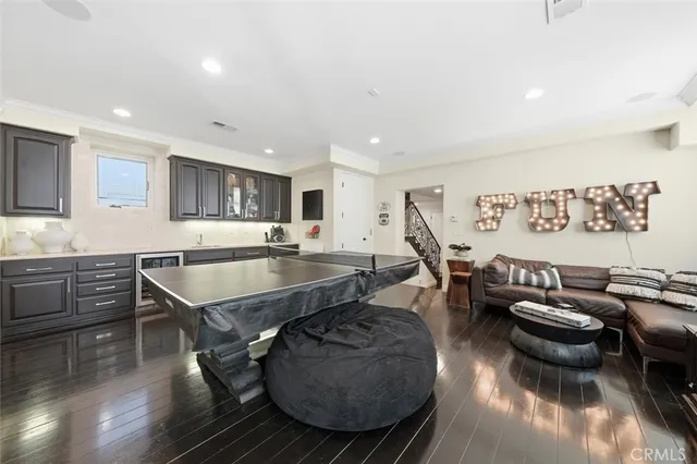 a bathroom with a shower sink and mirror