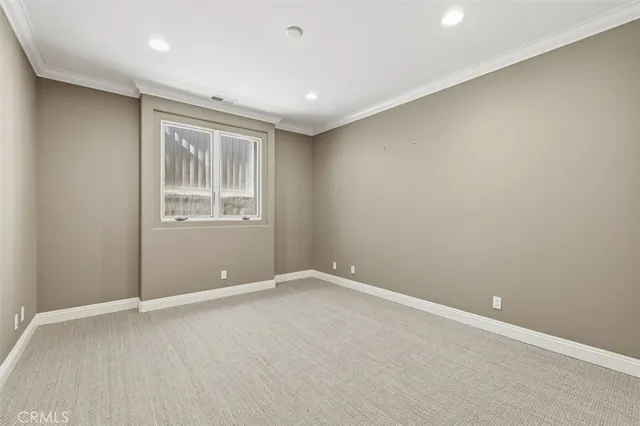 a bathroom with a granite countertop sink a mirror and a shower