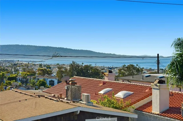 a view of a balcony with an ocean view